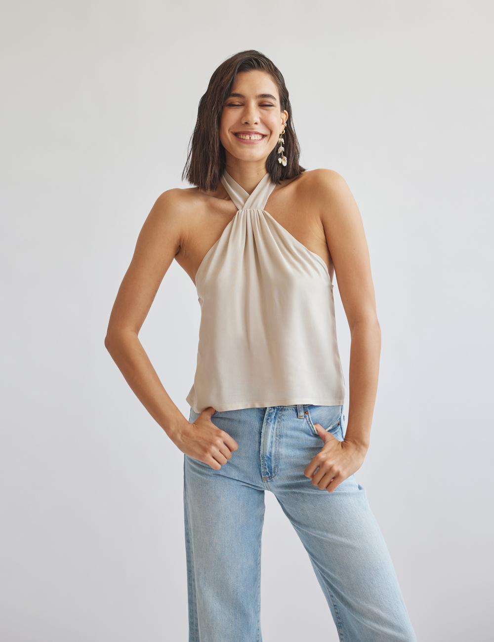 Woman loose blouse with halter neckline