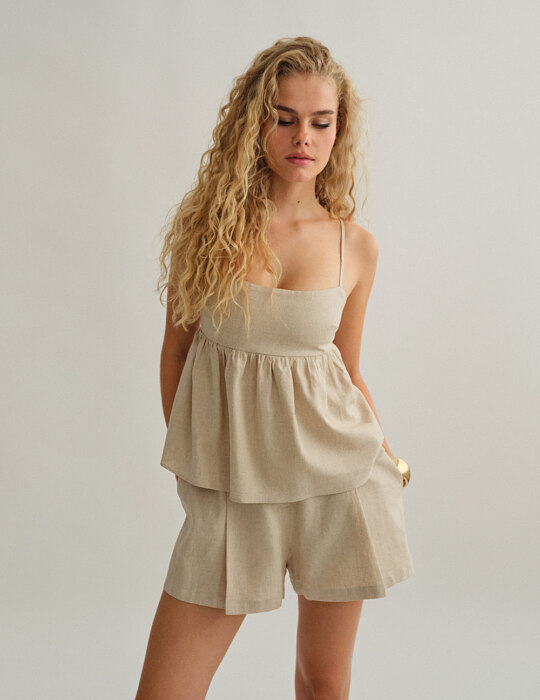 Γυναικεία λινή μπλούζα peplum